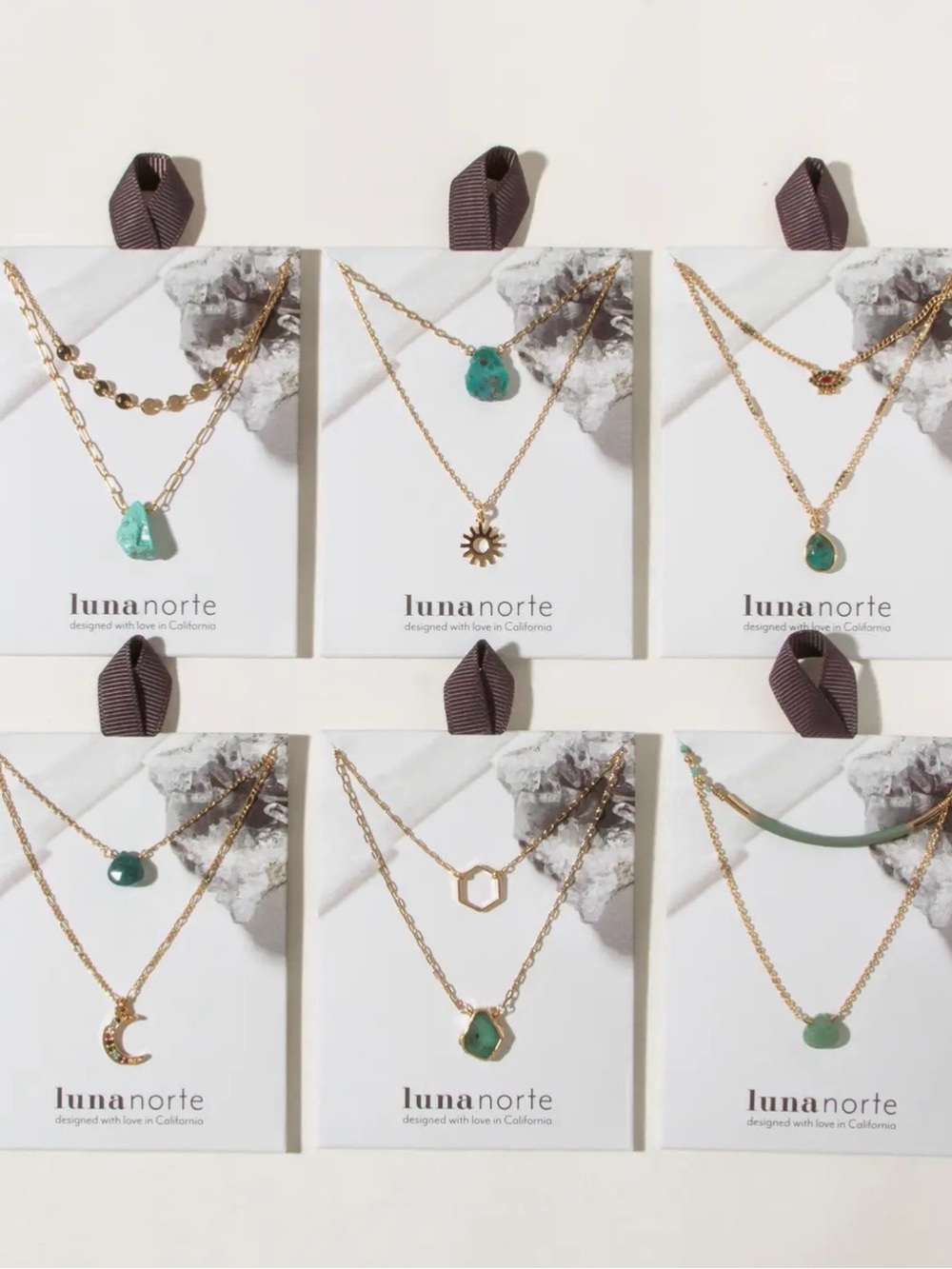 A460. Luna Norte Gold Necklace Set with Green Gemstone Accent
